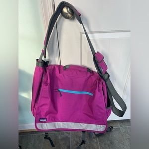 Pink laptop messenger bag